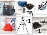 Assorted tech accessories and lifestyle items including projectors, LED light strip, orange bean bag chair, tripod, and wireless speaker; emphasis on modern, functional design and neutral colors.