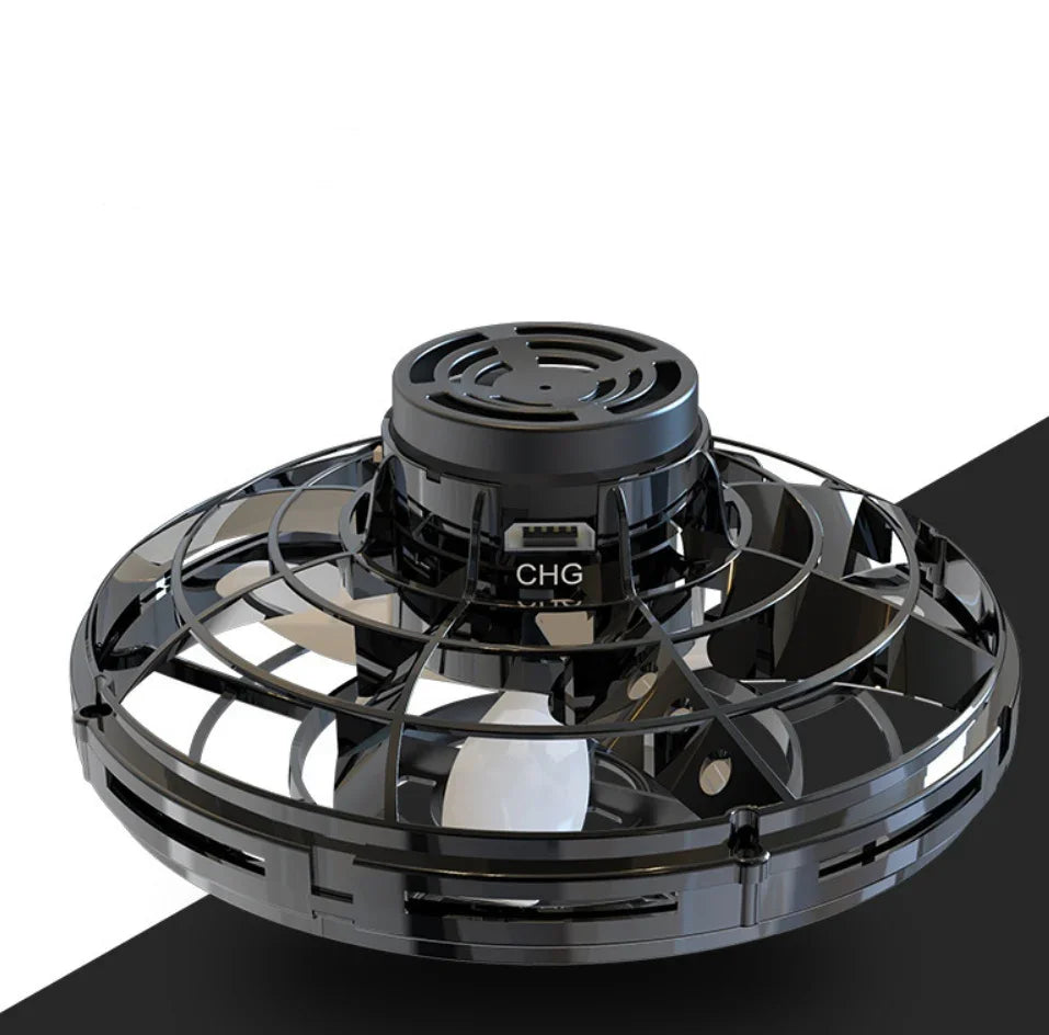 Black circular USB-powered mini cooling fan with protective plastic grill and compact design