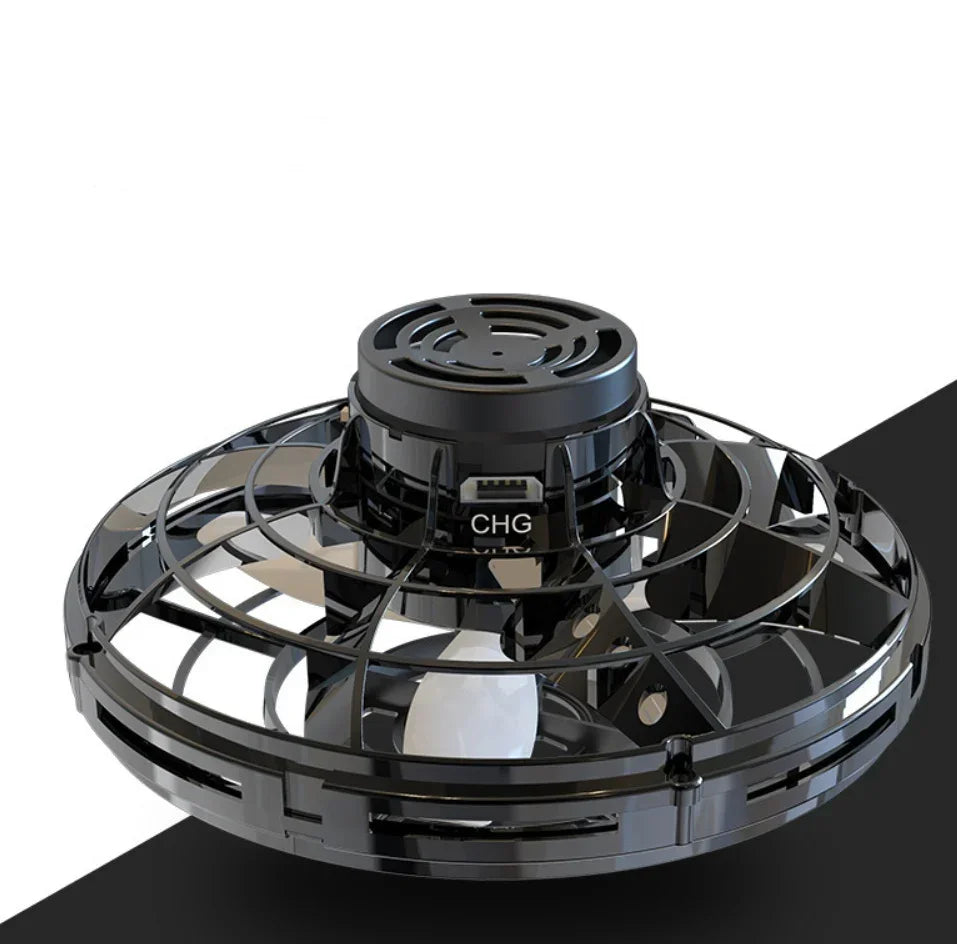 Black circular USB-powered mini cooling fan with protective plastic grill and compact design