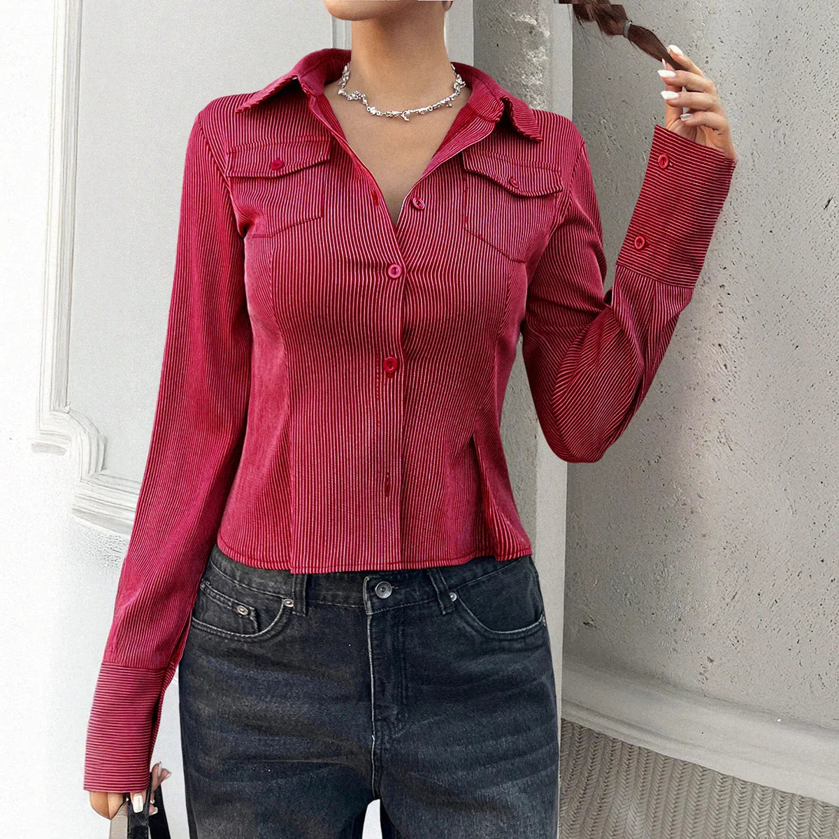 Fitted red and white pinstripe long sleeve shirt with collared neckline and chest pockets