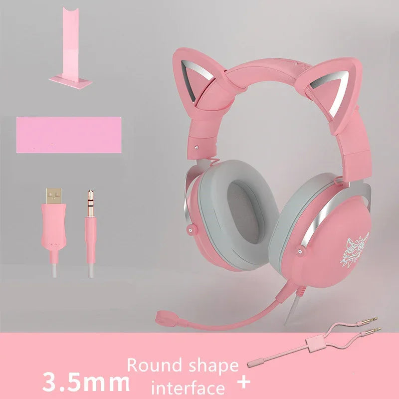 Pink over-ear headphones with cat ears, soft grey cushions, 3.5mm jack, and USB connector.