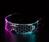 Futuristic LED visor eyewear with hexagonal pattern, glowing pink and blue, acrylic material