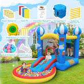 Kids playing in a blue and yellow inflatable bounce house with slide and ball pit on grass.