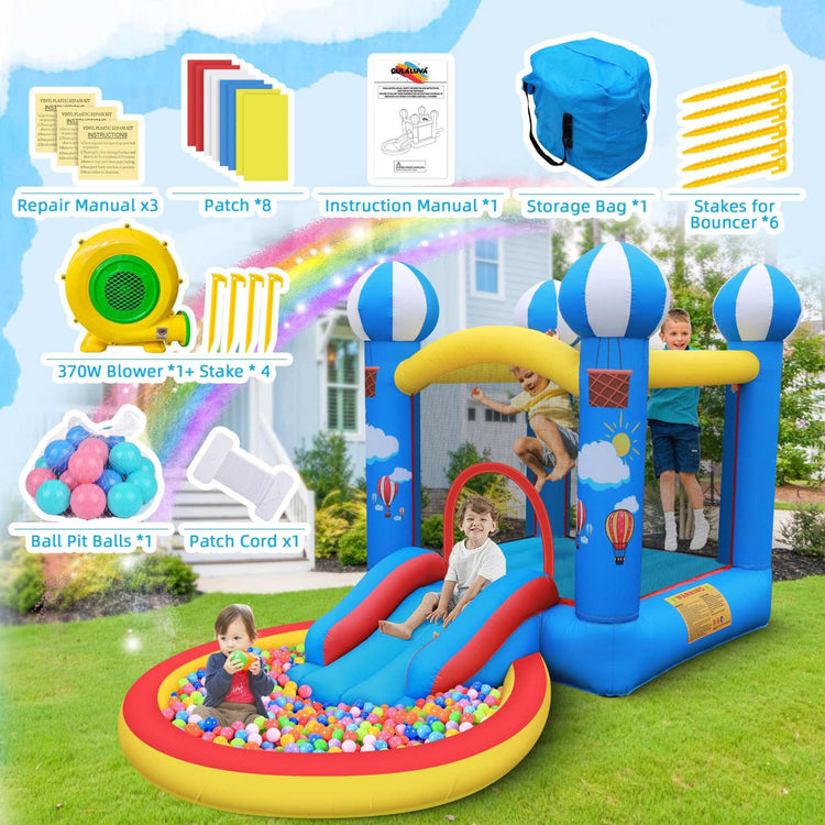 Kids playing in a blue and yellow inflatable bounce house with slide and ball pit on grass.