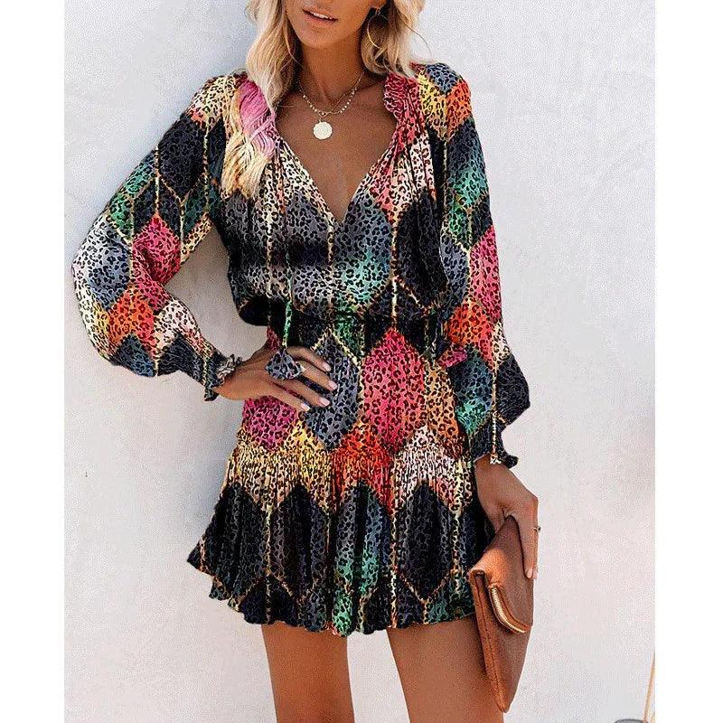 Woman wearing a colorful long sleeve mini dress with leopard print and relaxed fit