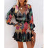 Woman wearing a colorful long sleeve mini dress with leopard print and relaxed fit