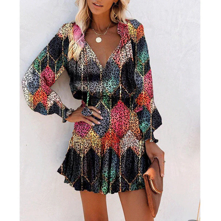 Woman wearing a colorful long sleeve mini dress with leopard print and relaxed fit