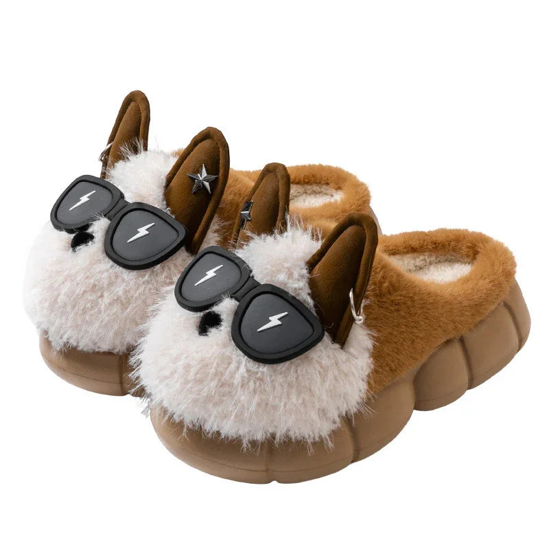 Brown plush animal slippers with fuzzy white front, 3D ears, and black sunglasses design.