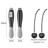 Digital cordless jump rope with black and gray ergonomic handles, LCD display, 18cm length, 3cm diameter.