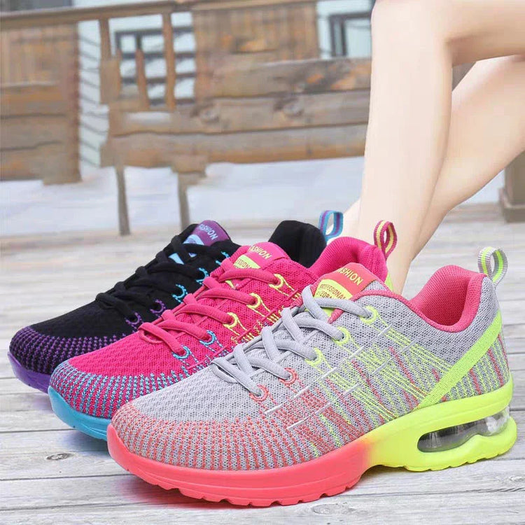 Colorful knit sneakers with gradient soles, mesh material, lace-up design, athletic fit