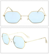 Geometric sunglasses with gold metal frame and light blue lenses, modern streetwear style