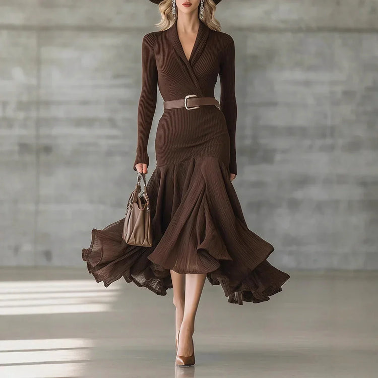 Woman wearing a fitted brown ribbed knit long-sleeve dress with flared ruffle hem