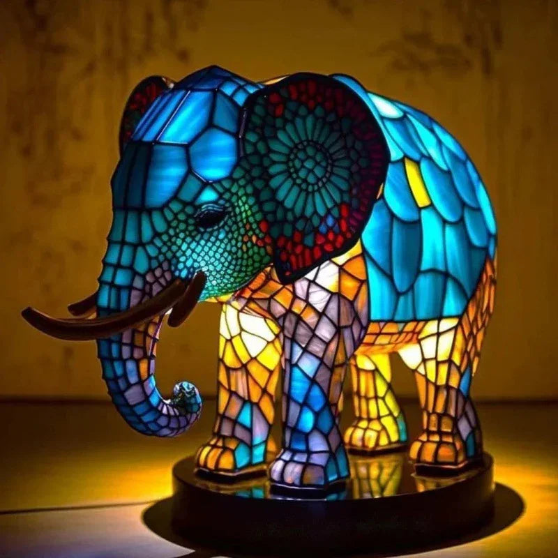 Colorful stained glass elephant lamp with intricate mosaic pattern and warm glow