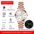 Rose gold stainless steel wristwatch with silver dial, luminous hands, and date display.