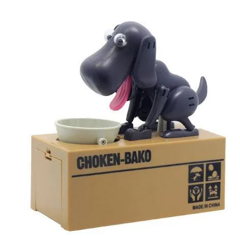 Black plastic dog coin bank toy with bowl on a tan box labeled CHOKEN-BAKO