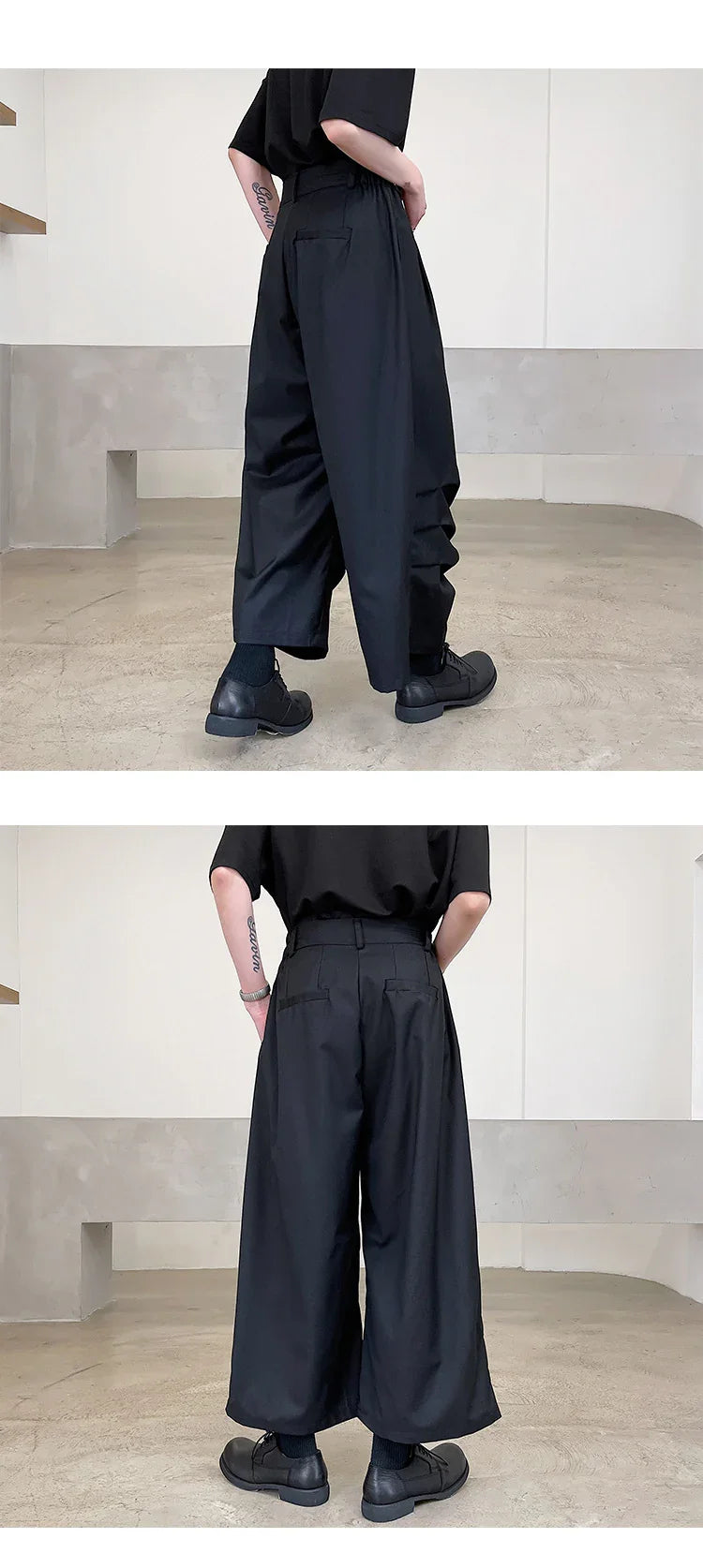 Wide-leg black pants with a relaxed fit, high waist, and smooth fabric, styled with black shoes.