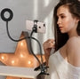 Flexible phone holder with ring light, black gooseneck stand, clips to desk, ideal for streaming or selfies