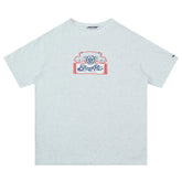 Light grey oversized t-shirt with short sleeves and graphic print on chest, casual streetwear style.