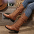 Brown lace-up knee-high boots with buckles, rugged sole, and leather-textile mix, slim fit.