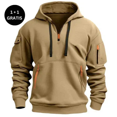 Beige streetwear pullover hoodie with orange zippers, zippered pockets, and relaxed fit