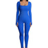 Woman wearing a vibrant blue ribbed long sleeve fitted jumpsuit with square neckline