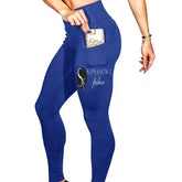 Woman wearing fitted blue high-waist leggings with side pocket, stretchy streetwear style