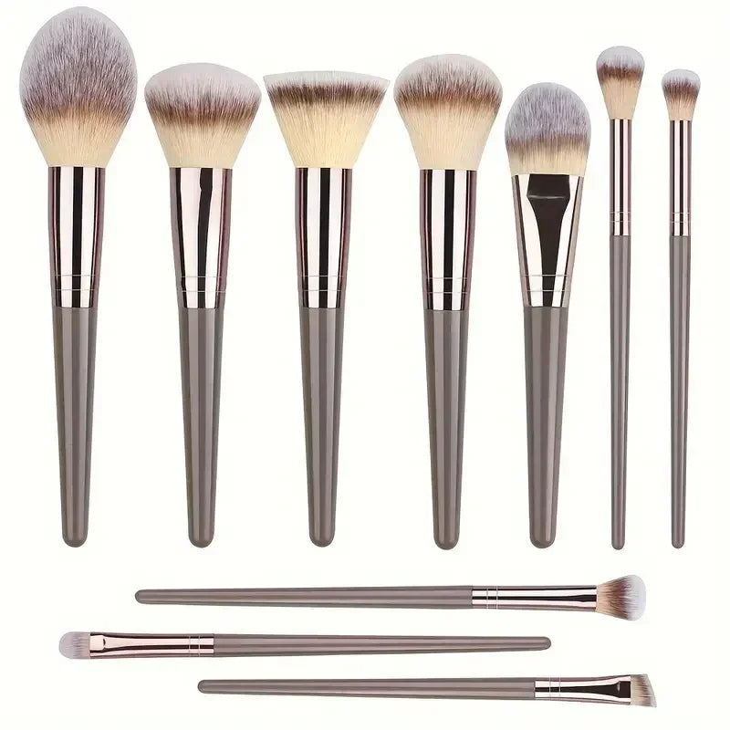 Set of 10 gray-handled makeup brushes with soft synthetic bristles, various shapes and sizes.