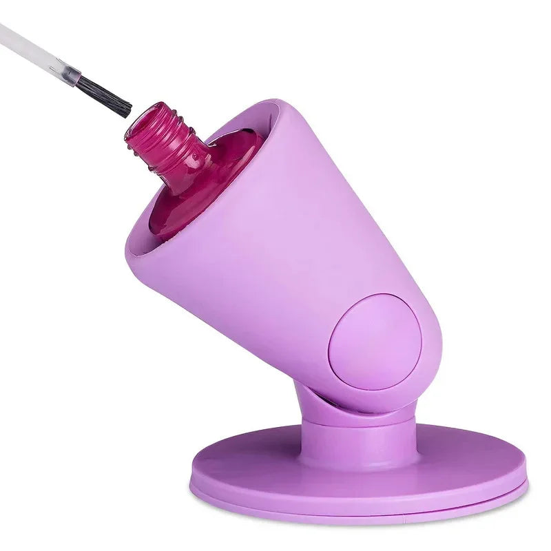Purple silicone nail polish bottle holder with angled design for easy application