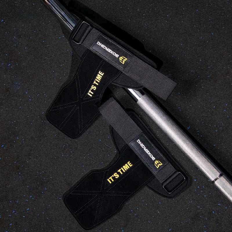 Black neoprene weightlifting wrist straps with yellow &