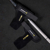 Black neoprene weightlifting wrist straps with yellow &