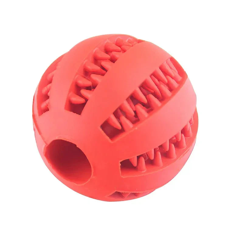 Red rubber ball with textured grooves and spikes, durable chew toy design.