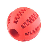 Red rubber ball with textured grooves and spikes, durable chew toy design.