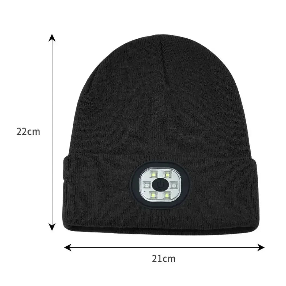 Black knit beanie with built-in LED headlamp, 22x21cm, soft material, relaxed fit.
