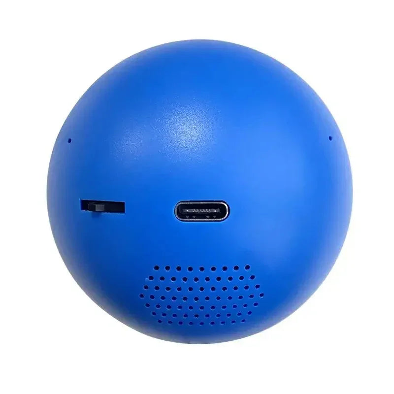 Round blue portable Bluetooth speaker with USB-C charging port and perforated speaker grille