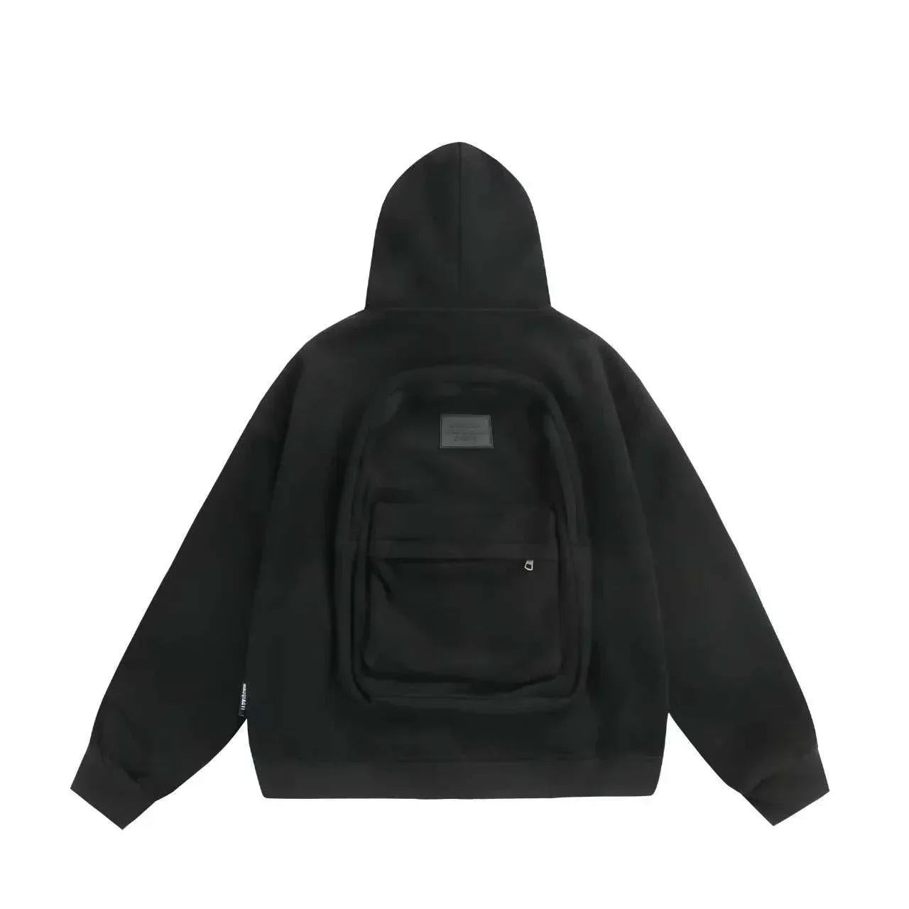 Black oversized hoodie with backpack detail on back, soft material, relaxed streetwear fit