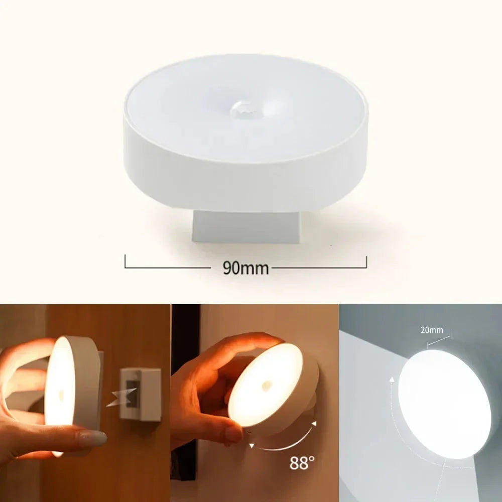 Round white motion sensor LED night light, wall-mounted, with adjustable angle feature