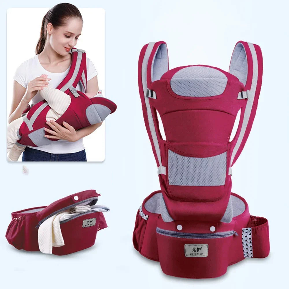 Red and gray ergonomic baby carrier with mesh panels, adjustable straps, and storage pockets