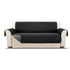 Black quilted sofa cover on beige upholstered couch, reversible, modern furniture protector