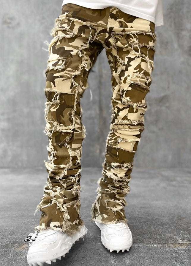 Slim fit camo cargo pants with heavy distressed details and frayed hems, streetwear style