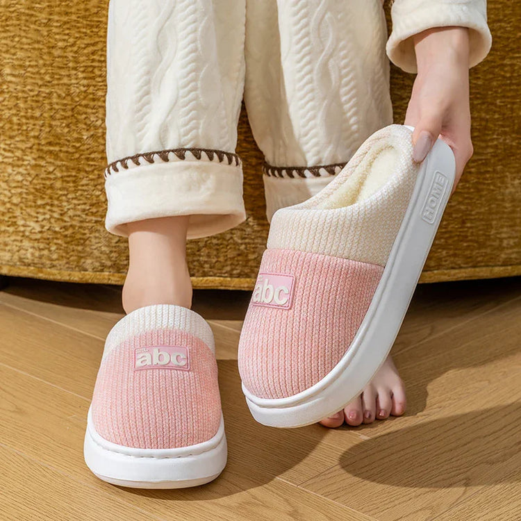 cozy pink and white knit slippers with rubber soles, soft plush lining, relaxed fit
