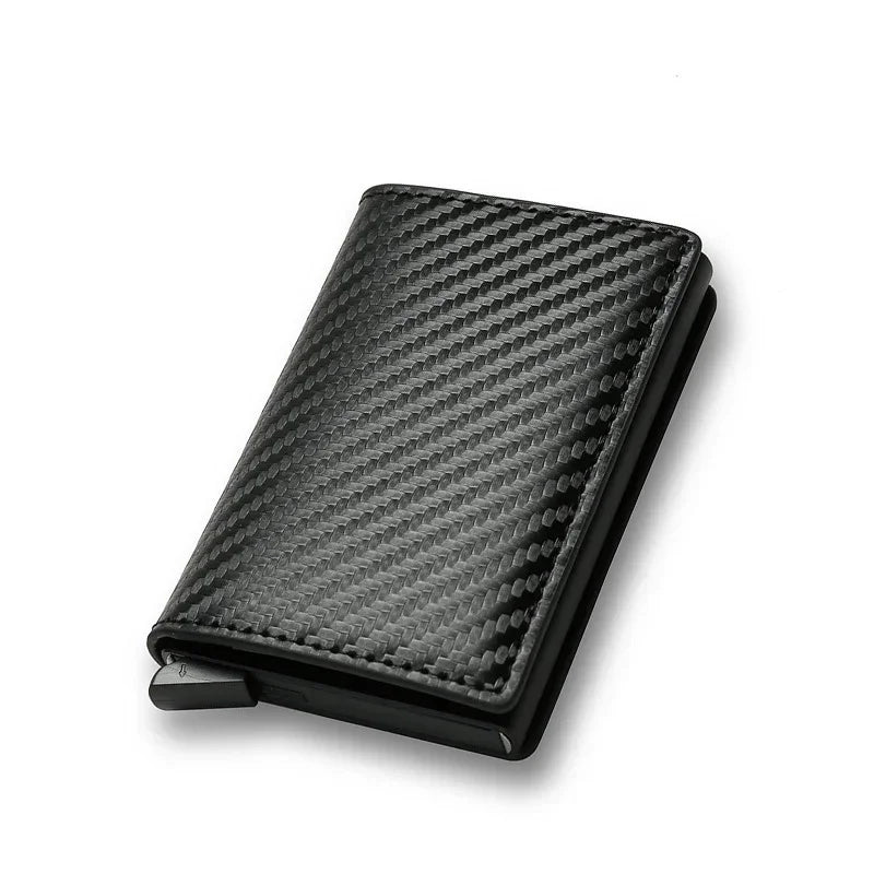 Slim black carbon fiber wallet with textured finish and minimalist modern design