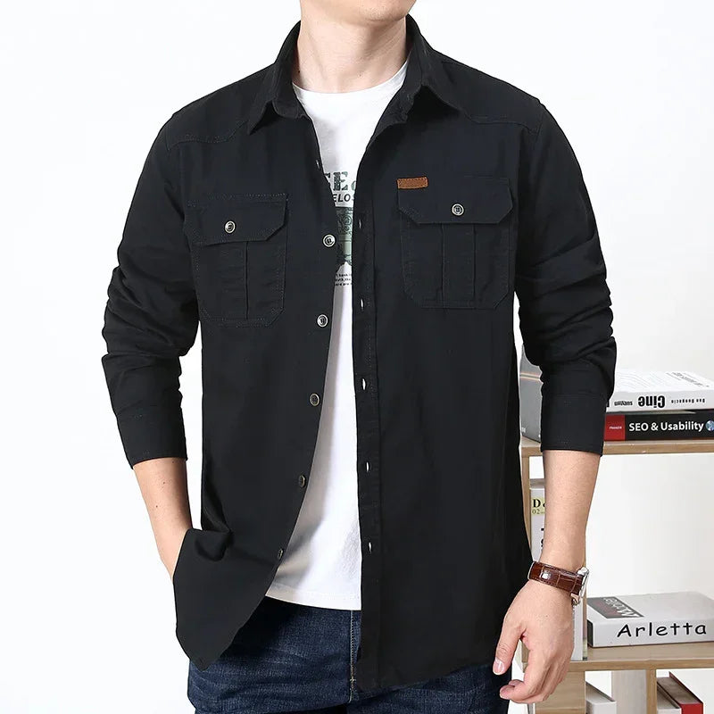 Men’s black button-up shirt with chest pockets, casual fit, worn over a white tee