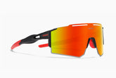 Futuristic sunglasses with large red mirrored shield lens, black and red frame, sporty fit