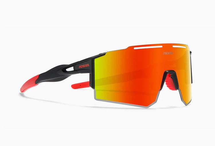 Futuristic sunglasses with large red mirrored shield lens, black and red frame, sporty fit