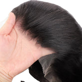 Close-up of natural black straight lace front wig, showing realistic hairline and mesh base.