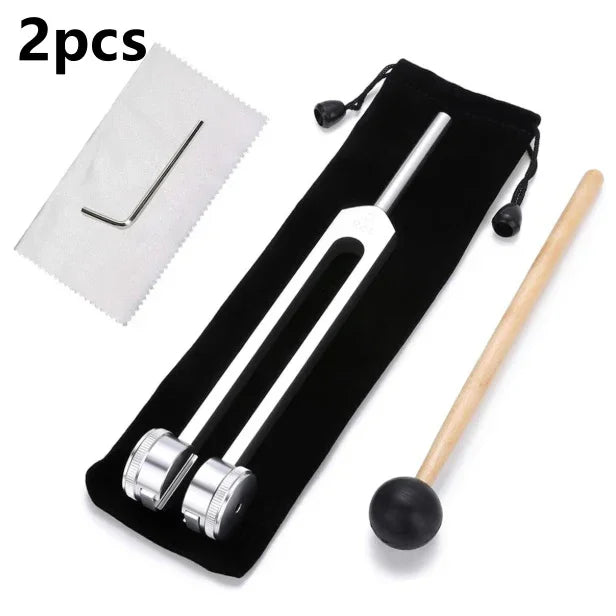 Silver tuning fork set with mallet, hex key, cleaning cloth, and black pouch