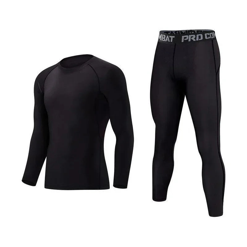 Black long-sleeve compression shirt and matching athletic leggings, slim-fit, stretchy fabric.