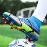 Blue and neon green soccer cleat with red studs, textured mesh material, snug fit, on field