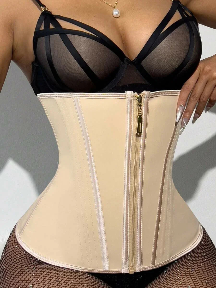 Beige waist trainer corset with front zipper, black mesh bra, and fishnet leggings