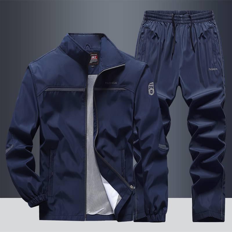 Men's navy blue tracksuit set with zip-up jacket and elastic waist pants, sporty fit, lightweight fabric